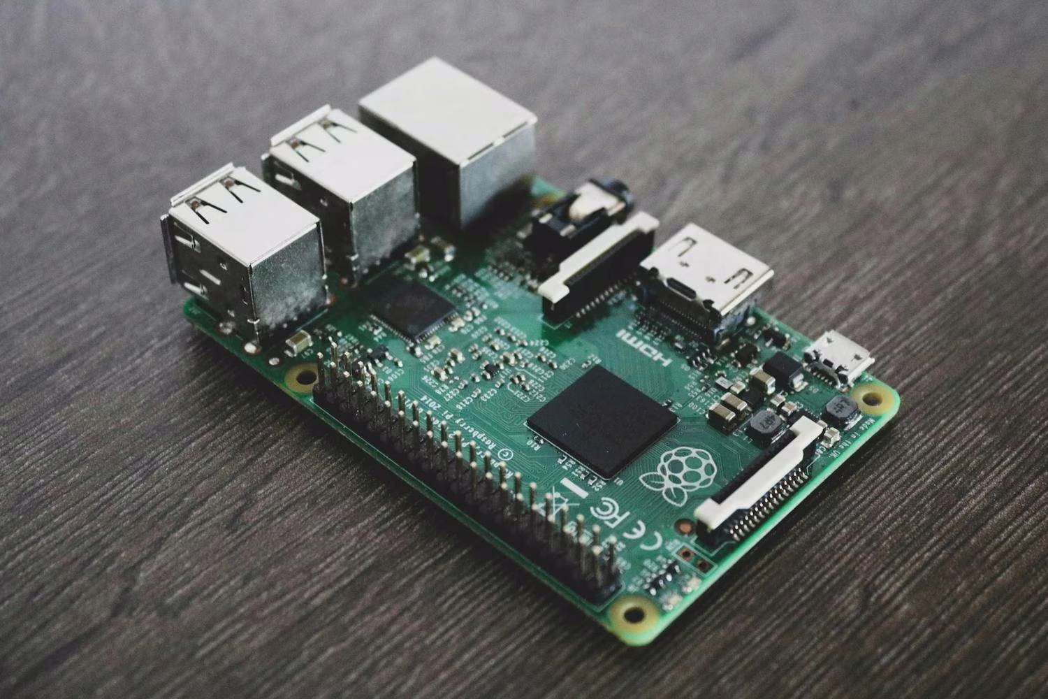 Raspberry Pi placed on a black wooden desk